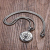 Close-up of Dominion Compass pendant – polished stainless steel men's pendant on chain