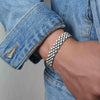 Silver Manly Mania Core Bracelet mockup on male wrist – Luxury stainless steel mens bracelet