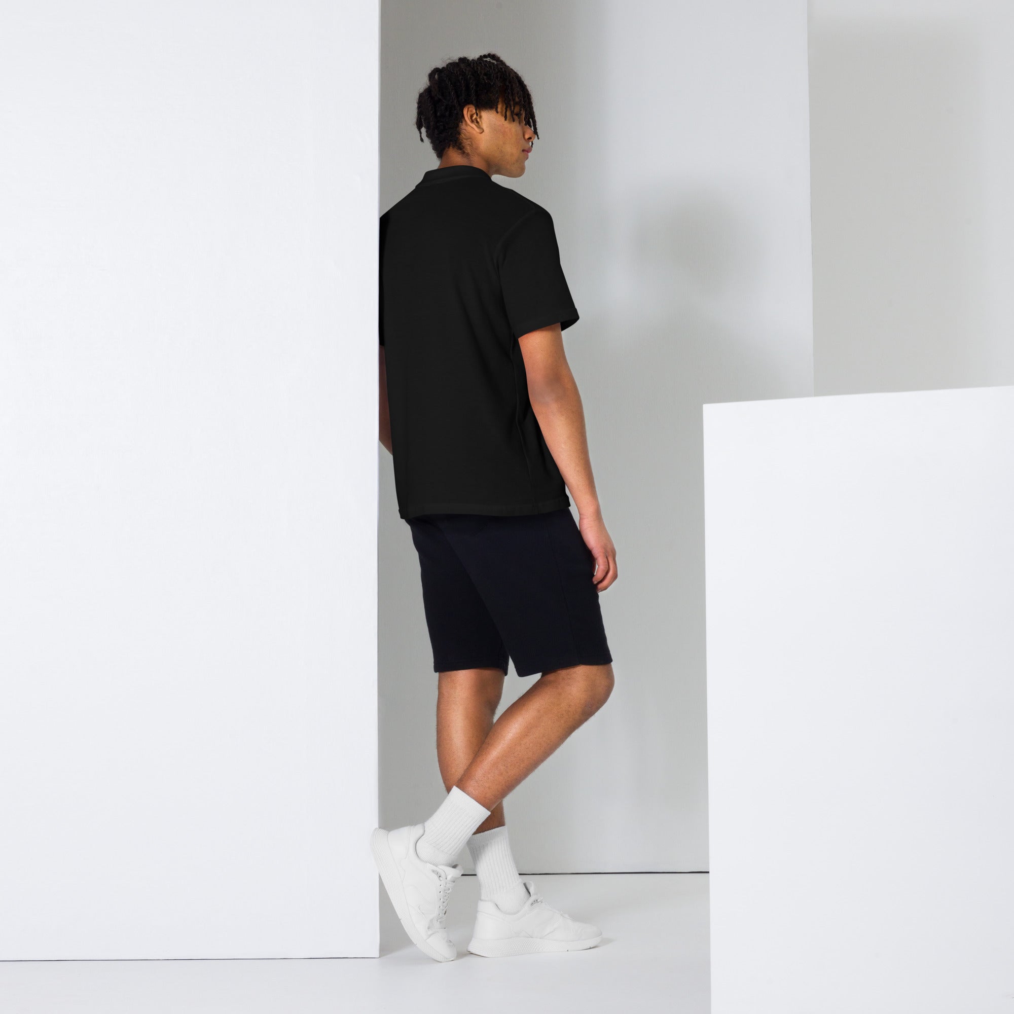Back view of Manly Mania Giant Polo Shirt in Black