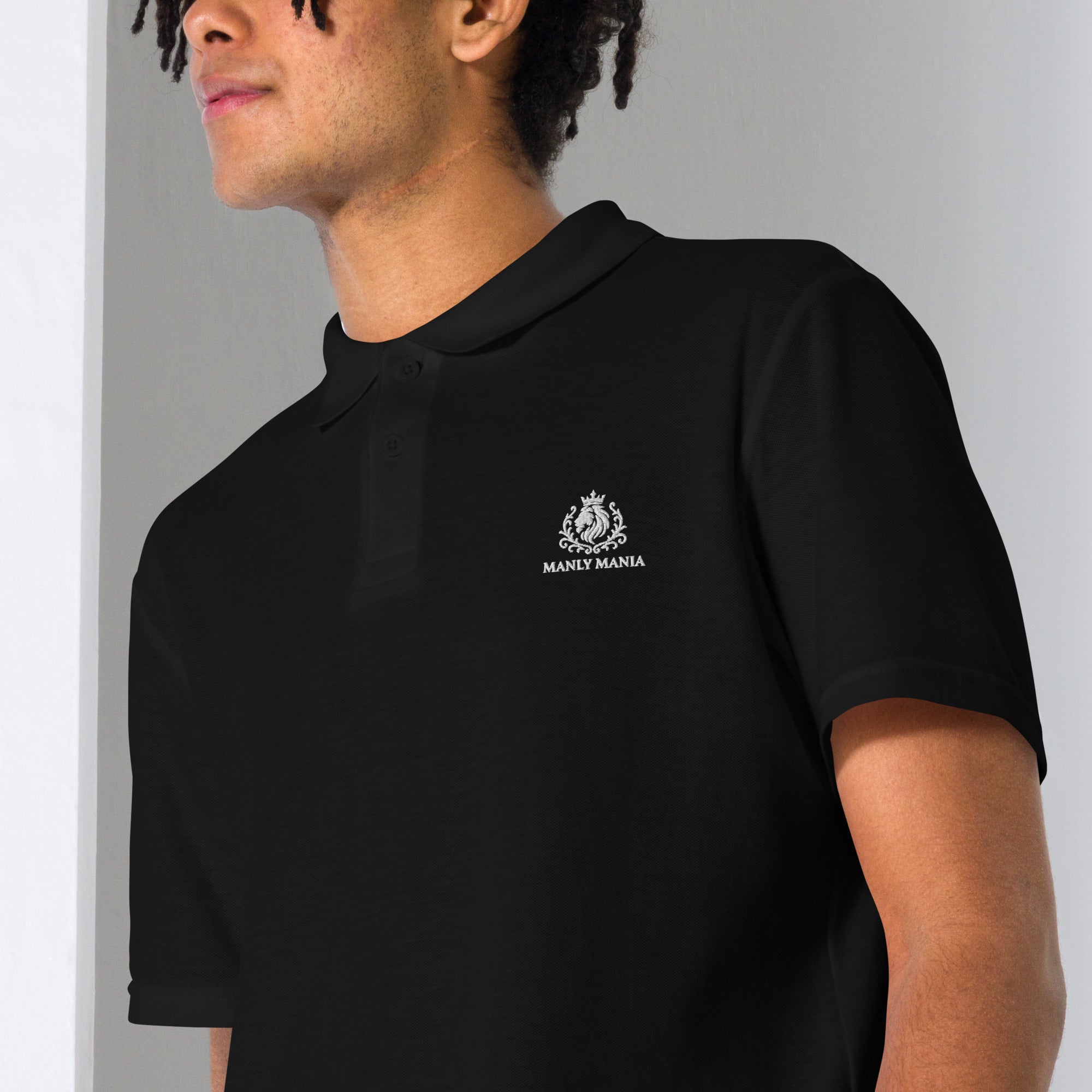 Black close-up view Manly Mania Legacy polo shirt