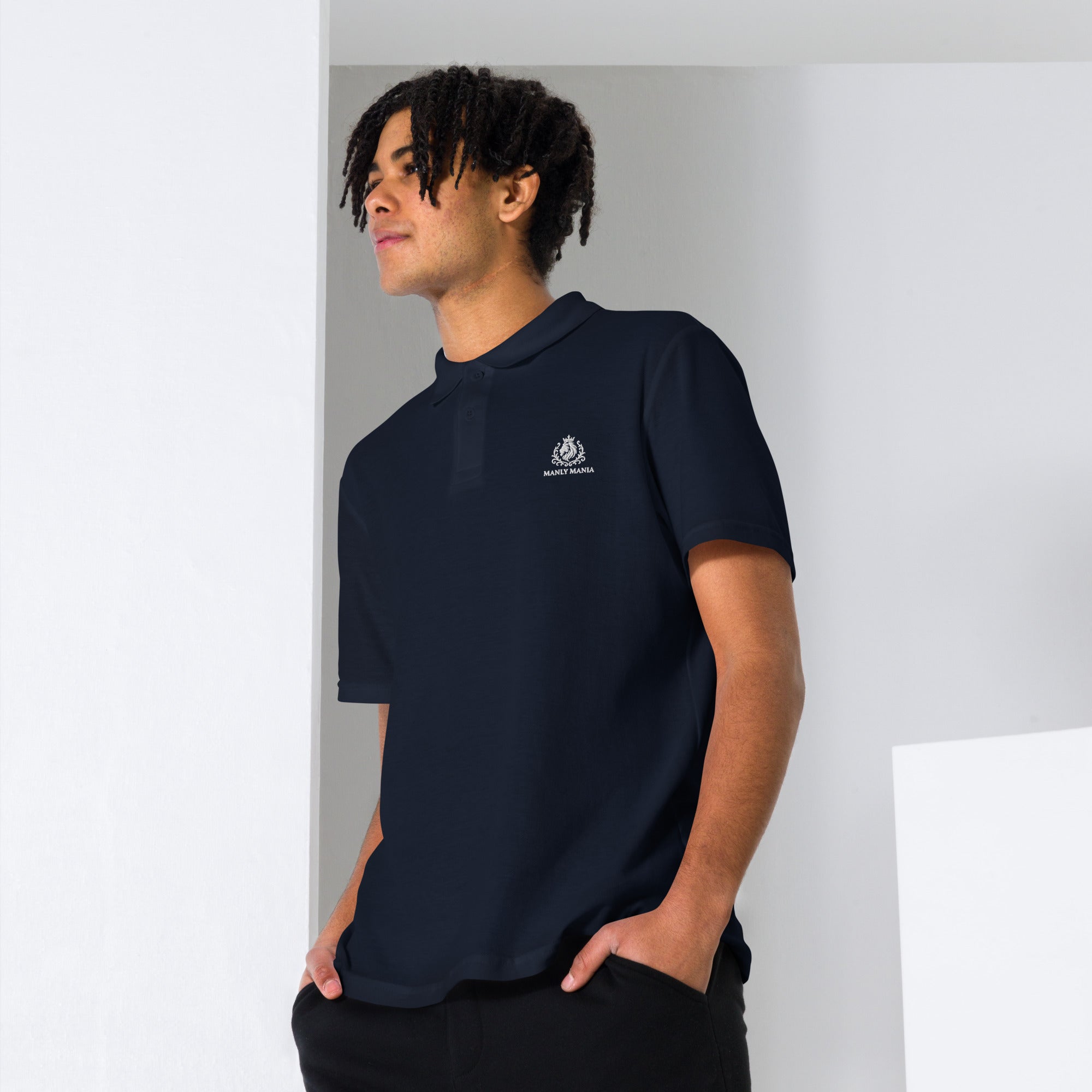 Navy close-up view Manly Mania Legacy polo shirt